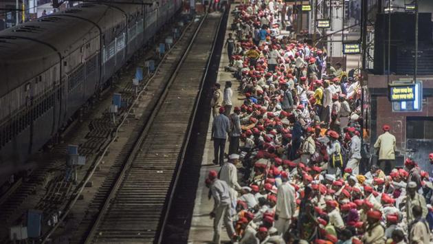 Farmers wait for the special train which was arranged by the central railway from CSMT to Bhusawal at CSTM station in Mumbai, Maharashtra for a massive farmer’s rally headed to the city. The agrarian crisis was a focal point with multiple rallies headed to the Maharashtra capital demanding fulfilment of promises made by government officials. (Pratik Chorge / HT Photo) 