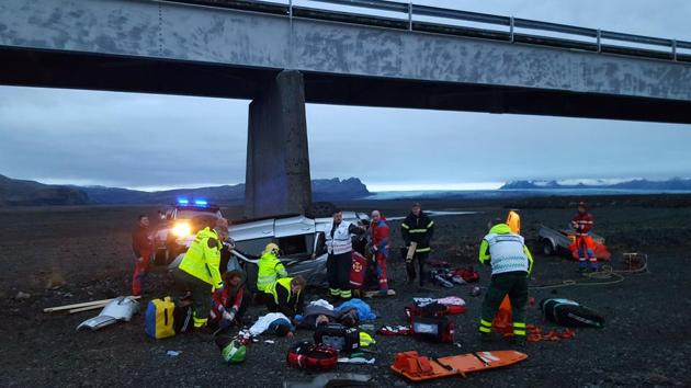 An SUV carrying seven members of a British family plunged off a high bridge Thursday in Iceland, killing three people and critically injuring the others, authorities said.(AP photo)