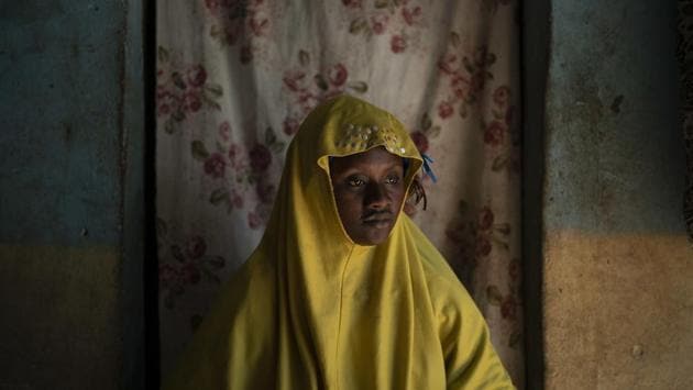 Mariama Konte wears a widow’s veil in a village near Goudiry, Senegal. Barely 20 years old, Konte was neither widow nor wife. For nearly four years, she told her two young children that their father is travelling for work. Only in the last few weeks has she begun to accept the possibility that Abdrahamane drowned at sea, like so many migrants from this dusty corner of eastern Senegal. (Felipe Dana / AP) Mariama Konte wears a widow’s veil in a village near Goudiry, Senegal. Barely 20 years old, Konte was neither widow nor wife. For nearly four years, she told her two young children that their father is travelling for work. Only in the last few weeks has she begun to accept the possibility that Abdrahamane drowned at sea, like so many migrants from this dusty corner of eastern Senegal. (Felipe Dana / AP)