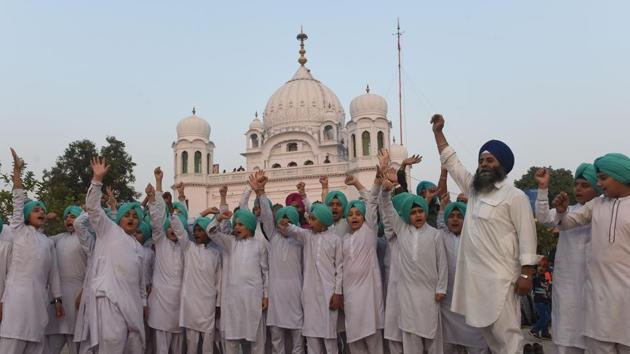 Sikh children shout slogans in front of the Kartarpur Gurdwara Sahib after a groundbreaking ceremony for the Kartarpur Corridor in Kartarpur on November 28, 2018. Pakistan Prime Minister Imran Khan launched the groundbreaking ceremony of the religious corridor between India and Pakistan. (File Photo) (AFP) Sikh children shout slogans in front of the Kartarpur Gurdwara Sahib after a groundbreaking ceremony for the Kartarpur Corridor in Kartarpur on November 28, 2018. Pakistan Prime Minister Imran Khan launched the groundbreaking ceremony of the religious corridor between India and Pakistan. (File Photo) (AFP)
