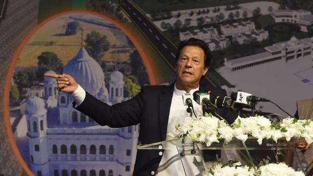 Pakistan Prime Minister Imran Khan launched the groundbreaking ceremony of the religious corridor between India and Pakistan.(Photo by ARIF ALI / AFP) Pakistan Prime Minister Imran Khan launched the groundbreaking ceremony of the religious corridor between India and Pakistan.(Photo by ARIF ALI / AFP)