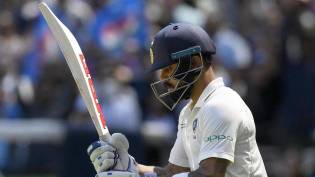 Virat Kohli enters the ground during play on day one of the third Test between India and Australia.(AP)