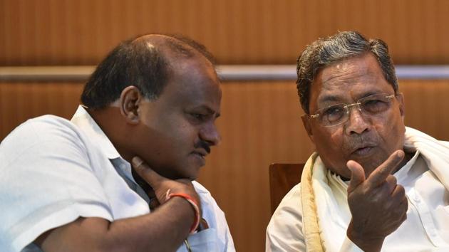 Former chief minister of Karnataka and the Chairman of Co-ordination committee Siddaramaiah(R) and the chief minister of Karnataka, H D Kumarswamy(L) during a joint press conference of Congress and Janta Dal (Secular) in Bengaluru on October 20. (Arijit Sen/HT Photo) Former chief minister of Karnataka and the Chairman of Co-ordination committee Siddaramaiah(R) and the chief minister of Karnataka, H D Kumarswamy(L) during a joint press conference of Congress and Janta Dal (Secular) in Bengaluru on October 20. (Arijit Sen/HT Photo)