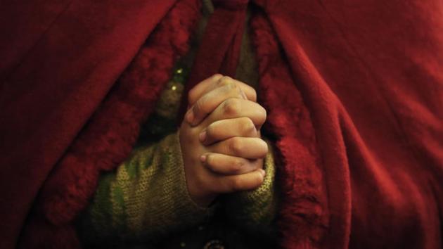 A worshipper prayers at the holy family Catholic Church on the occasion of Christmas in Srinagar, Jammu and Kashmir. (Mukhtar Khan / AP) A worshipper prayers at the holy family Catholic Church on the occasion of Christmas in Srinagar, Jammu and Kashmir. (Mukhtar Khan / AP)