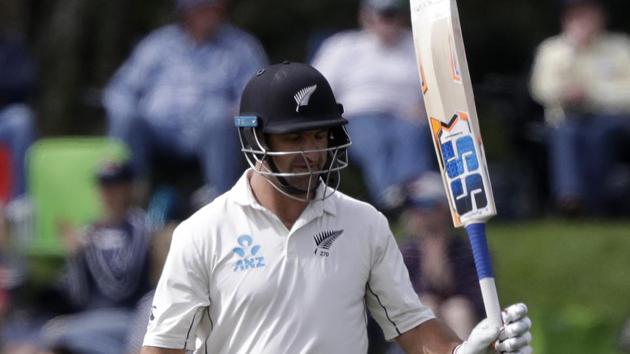 New Zealand's Colin de Grandhomme gestures after reaching 50 runs during play on day three of the second cricket test between New Zealand and Sri Lanka at Hagley Oval in Christchurch.(AP)