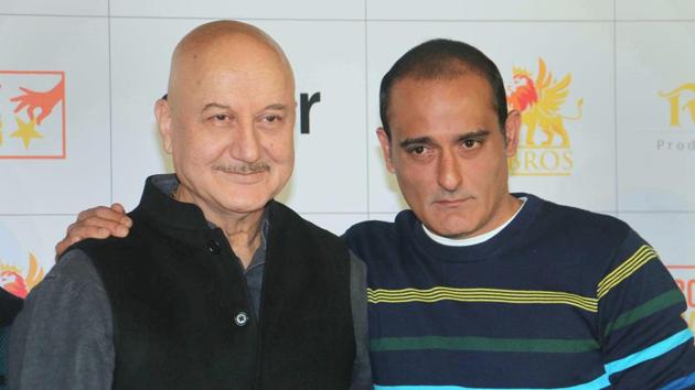 Bollywood actors Anupam Kher and Akshaye Khanna at the trailer launch of film ‘The Accidental Prime Minister’. The trailer, which released today, drew criticism from the opposition Congress, which called it a ‘fake propaganda’. As the Congress and the BJP traded barbs over the biopic, Anupam Kher – who plays the role of former Prime Minister Manmohan Singh – said ‘we can’t change history.’ (PTI) Bollywood actors Anupam Kher and Akshaye Khanna at the trailer launch of film ‘The Accidental Prime Minister’. The trailer, which released today, drew criticism from the opposition Congress, which called it a ‘fake propaganda’. As the Congress and the BJP traded barbs over the biopic, Anupam Kher – who plays the role of former Prime Minister Manmohan Singh – said ‘we can’t change history.’ (PTI)