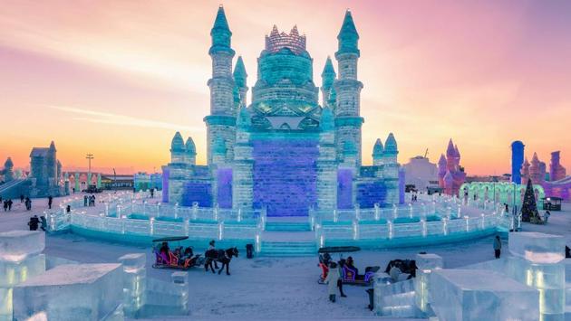 People visit the Harbin Ice-Snow World in Harbin, China’s northeastern Heilongjiang province. The Harbin Ice and Snow Sculpture Festival will kick off in the city on January 4, 2019, which attracts hundreds of thousands of visitors annually. (AFP) People visit the Harbin Ice-Snow World in Harbin, China’s northeastern Heilongjiang province. The Harbin Ice and Snow Sculpture Festival will kick off in the city on January 4, 2019, which attracts hundreds of thousands of visitors annually. (AFP)