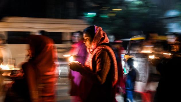 Hindu activists participate in a candle-light vigil outside Kerala State house, as they protest against Kerala government supporting women devotees entering Kerala’s Sabarimala Ayyapa temple, in New Delhi. (Chandan Khanna / AFP) Hindu activists participate in a candle-light vigil outside Kerala State house, as they protest against Kerala government supporting women devotees entering Kerala’s Sabarimala Ayyapa temple, in New Delhi. (Chandan Khanna / AFP)