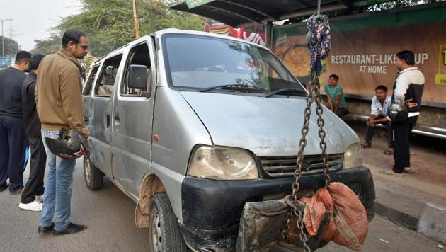 A view of the school van, which was involved in an accident with a tempo resulting in the death of one student, is seen parked at Timar Pur police Station in New Delhi, India(Sushil Kumar/HT PHOTO)