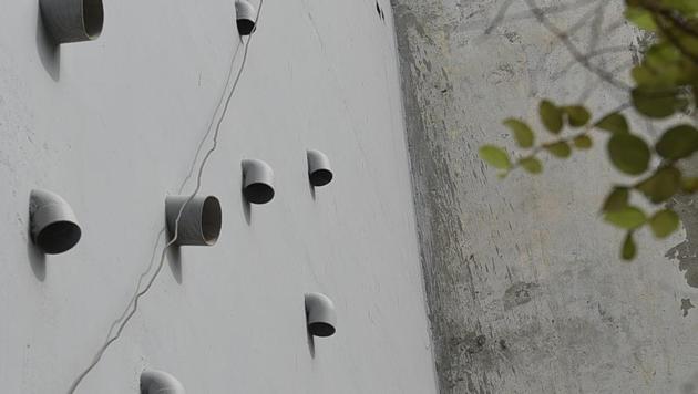 A view of 11 pipes protruding out of the house where 11 members of the Bhatia family allegedly committed suicide, at Burari in New Delhi(Sanchit Khanna/HT PHOTO) A view of 11 pipes protruding out of the house where 11 members of the Bhatia family allegedly committed suicide, at Burari in New Delhi(Sanchit Khanna/HT PHOTO)