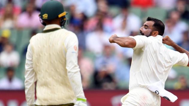 India's paceman Mohammed Shami (R) Jubilates after dismissing Australia's batsman Usman Khawaja (L) during day four of the third cricket Test match between Australia and India in Melbourne. (AFP)