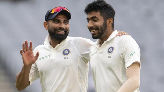 India's Mohammed Shami, left, speaks with Jasprit Bumrah. (AP) India's Mohammed Shami, left, speaks with Jasprit Bumrah. (AP)