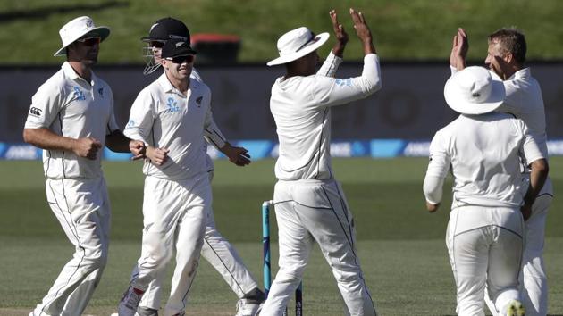 New Zealand's Neil Wagner is congratulated by teammates after taking the wicket of Sri Lanka's Roshen Silva during play on day four of the second cricket test between New Zealand and Sri Lanka at Hagley Oval in Christchurch. (AP) New Zealand's Neil Wagner is congratulated by teammates after taking the wicket of Sri Lanka's Roshen Silva during play on day four of the second cricket test between New Zealand and Sri Lanka at Hagley Oval in Christchurch. (AP)