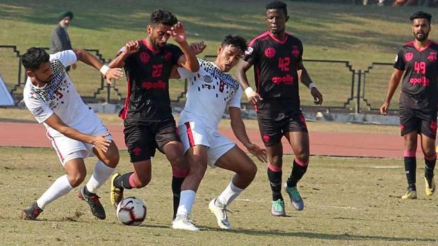 Mohun Bagan (white) and Minerva Punjab FC Hero I-League Football Mach At Tau Devi Lal Stadium Panchkula.(HT Photo)