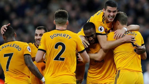 Wolverhampton Wanderers' Willy Boly celebrates with team mates after scoring their first goal. (Action Images via Reuters) Wolverhampton Wanderers' Willy Boly celebrates with team mates after scoring their first goal. (Action Images via Reuters)