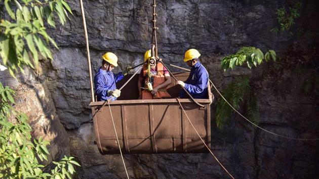 Navy personnel conduct a rescue task at the site of a coal mine collapse at Ksan, in Jaintia Hills district of Meghalaya on December 29.(PTI Photo)