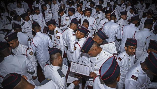 Cadets check their report cards during Convocation Ceremony of 134th Course of National Defence Academy (NDA) on May 29. A total of 344 cadets graduated from the academy as they passed through the portals of the prestigious Khetrapal parade ground. The group included 238 cadets from the Army, 26 cadets from the Navy and 80 cadets from the Air Force. Fifteen cadets from friendly foreign countries also passed out from the academy. The cadets are from Afghanistan, Bhutan, Maldives, Kazakhstan, Lesotho and Tajikistan. (Pratham Gokhale/HT Photo) 