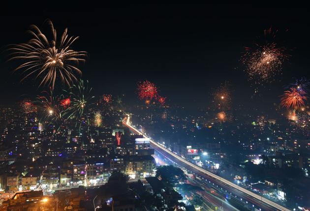 A long exposure picture of firecrackers lighting up the skyline in Dhankawdi area on November 7 on acoount of Diwali. Picture shot from Ganga Ishannya tower. (Pratham Gokhale/HT Photo) 