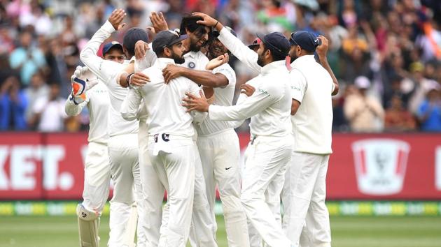 India's players celebrate after winning the third test match between Australia and India at the MCG in Melbourne. (REUTERS)