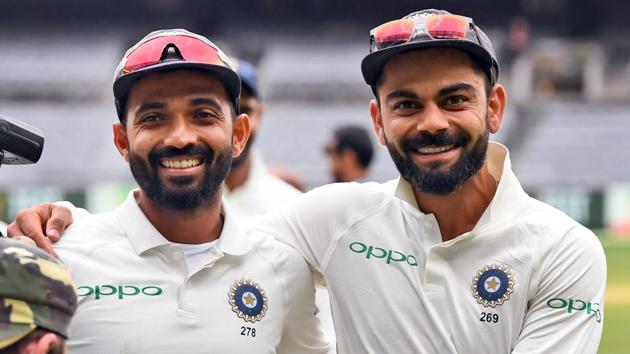 Virat Kohli (R) and Ajinkya Rahane (L) celebrate on the final day of the third Test match between Australia and India.(AFP)