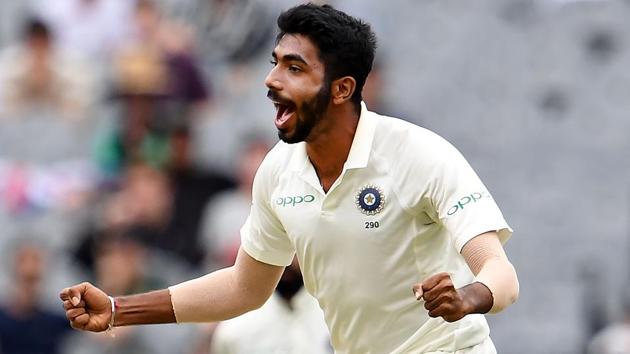 Jasprit Bumrah celebrates after taking the wicket of Australia's batsman Aaron Finch.(AFP)