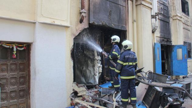 Fire Brigade personnel at Sadhana building in Worli on Sunday. (HT Photo) Fire Brigade personnel at Sadhana building in Worli on Sunday. (HT Photo)
