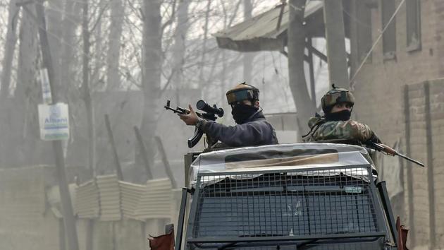 Army soldiers leave after the end of an encounter with the militants at Kuthipora village, Chattergam in Budgam. By December 29, forces killed at least 240 militants, including 12 top commanders of various militant groups. (PTI Photo) Army soldiers leave after the end of an encounter with the militants at Kuthipora village, Chattergam in Budgam. By December 29, forces killed at least 240 militants, including 12 top commanders of various militant groups. (PTI Photo)