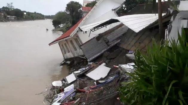 A destroyed house is seen after a tropical depression descended upon Daet, Camarines Norte, the Philippines.(REUTERS)