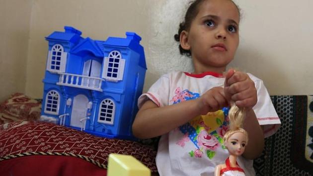 Buthaina Mansur al-Rimi’s life has changed drastically since last year -- orphaned in Sanaa, the little girl controversially ended up in Saudi Arabia for medical care and has just returned to Yemen’s capital. (AFP) Buthaina Mansur al-Rimi’s life has changed drastically since last year -- orphaned in Sanaa, the little girl controversially ended up in Saudi Arabia for medical care and has just returned to Yemen’s capital. (AFP)