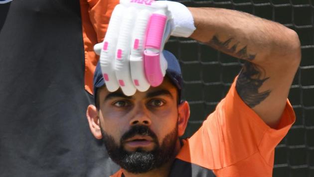 Virat Kohli plays an imaginary shot during a training session in Melbourne.(AFP)