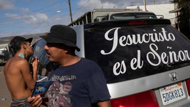 Writing reads “ Jesus Christ is the Lord” is seen on a car window outside a temporary shelter in Tijuana, Mexico. (Alkis Konstantinidis / Reuters) Writing reads “ Jesus Christ is the Lord” is seen on a car window outside a temporary shelter in Tijuana, Mexico. (Alkis Konstantinidis / Reuters)