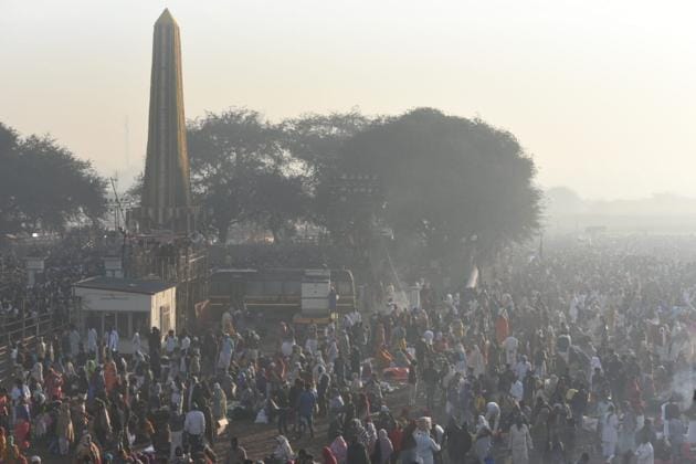 Thousands of Dalits gathered in Bhima Koregaon of Maharashtra’s Pune district to mark the 201st anniversary of a British-era war as the administration threw a protective ring around the small village to avoid the repeat of the large-scale violence last year. The violence broke out on January 1 last year in Bhima Koregaon and nearby villages during the bicentennial celebration of the war after unidentified people started pelting stones and set vehicles on fire. (Pratham Gokhale / HT Photo) Thousands of Dalits gathered in Bhima Koregaon of Maharashtra’s Pune district to mark the 201st anniversary of a British-era war as the administration threw a protective ring around the small village to avoid the repeat of the large-scale violence last year. The violence broke out on January 1 last year in Bhima Koregaon and nearby villages during the bicentennial celebration of the war after unidentified people started pelting stones and set vehicles on fire. (Pratham Gokhale / HT Photo)