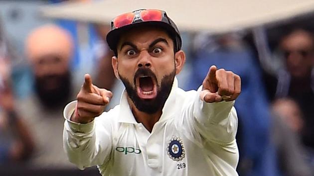 India's captain Virat Kohli celebrates the wicket of Australia's Pat Cummins. (AFP) India's captain Virat Kohli celebrates the wicket of Australia's Pat Cummins. (AFP)