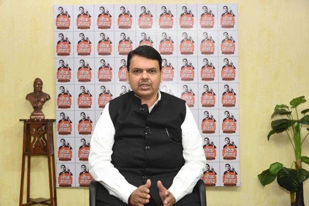 Chief minister Devendra Fadnavis interacts with the beneficiaries on Wednesday.(HT PHOTO)