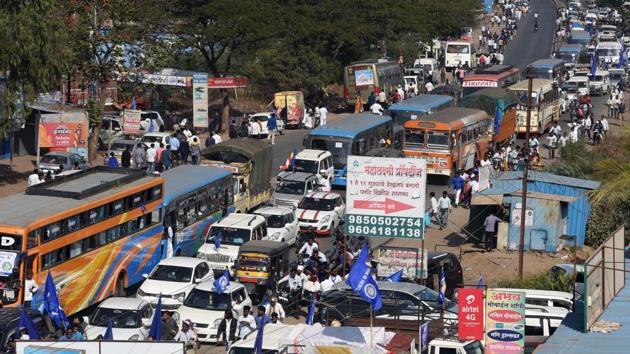 Traffic jam at Shikrapur as people visit Vijay Stambh to pay tribute on the occasion of 201st anniversary of the Bhima Koregaon battle on Tuesday. Heavy vehicles coming from Ahmednagar to Pune from the main highway were re-routed through the Shikrapur-Chakan road stretch. Similarly, vehicles plying from Ahmednagar road to Hadapsar were diverted to Shikrapur-Talegaon Dhamdere-Kedgaon-Chauphula-Solapur stretch. Commuters going to Ahmednagar from Pune hade to go via Chakan or Kharadi bypass via Hadapsar-Solapur-Kegaon Chauphula stretch. The new traffic arrangement on the entire Pune-Ahmednagar route had come into effect from midnight of December 31, 2018 till midnight of January 1, 2019. (Pratham Gokhale/HT Photo) Traffic jam at Shikrapur as people visit Vijay Stambh to pay tribute on the occasion of 201st anniversary of the Bhima Koregaon battle on Tuesday. Heavy vehicles coming from Ahmednagar to Pune from the main highway were re-routed through the Shikrapur-Chakan road stretch. Similarly, vehicles plying from Ahmednagar road to Hadapsar were diverted to Shikrapur-Talegaon Dhamdere-Kedgaon-Chauphula-Solapur stretch. Commuters going to Ahmednagar from Pune hade to go via Chakan or Kharadi bypass via Hadapsar-Solapur-Kegaon Chauphula stretch. The new traffic arrangement on the entire Pune-Ahmednagar route had come into effect from midnight of December 31, 2018 till midnight of January 1, 2019. (Pratham Gokhale/HT Photo)
