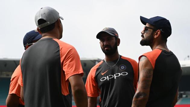 India's captain Virat Kohli (R) talks to teammates before a training session ahead of the fourth and final Test against Australia at the Sydney Cricket Ground in Sydney. (AFP) India's captain Virat Kohli (R) talks to teammates before a training session ahead of the fourth and final Test against Australia at the Sydney Cricket Ground in Sydney. (AFP)