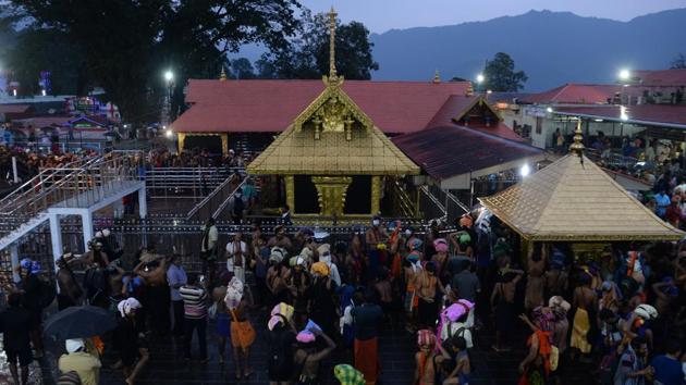 Devotees are pictured at the Lord Ayyappa temple in Sabarimala in Kerala on November 16.(AFP File Photo)