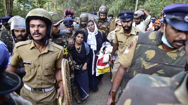 The BJP and other groups protested across Kerala after two women in their 40s entered the Sabarimala temple, in a first after the Supreme Court lifted the ban on menstruating women inside the shrine. The women -- Bindhu, a lawyer, and activist Kanakadurga -- said that they offered prayers at the hilltop shrine dedicated to Lord Ayyappa at 3:45 am and came back to Pamba, the base camp, at 5 am. (AFP File) The BJP and other groups protested across Kerala after two women in their 40s entered the Sabarimala temple, in a first after the Supreme Court lifted the ban on menstruating women inside the shrine. The women -- Bindhu, a lawyer, and activist Kanakadurga -- said that they offered prayers at the hilltop shrine dedicated to Lord Ayyappa at 3:45 am and came back to Pamba, the base camp, at 5 am. (AFP File)