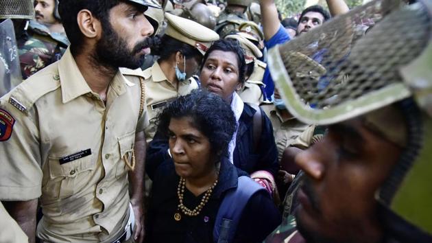 A teacher, Bindu Ammini, and activist Kanakadurga, both in their 40s, prayed at the temple on Wednesday with the police help. Kerala chief minister Pinarayi Vijayan confirmed the two had indeed prayed there.(AFP)