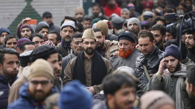 Hurriyat leader and chief cleric of Srinagar mosque, Jamia Masjid, Mirwaiz Umar Farooq on Wednesday led a rally against the desecration of the mosque by a group of masked youth carrying IS flags.(AP)