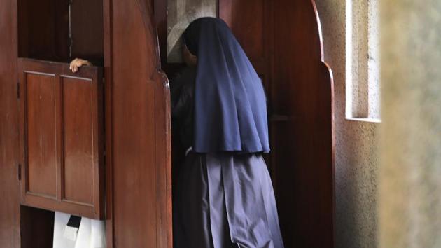 A nun partakes in the sacrament of confession. This summer, one nun forced the issue into the open. When repeated complaints to church officials brought no response, a 44-year-old nun filed a police complaint against the bishop who oversees her order, accusing him of raping her 13 times over two years. A group of nuns launched a public protest to demand the bishop’s arrest. (Manish Swarup / AP) A nun partakes in the sacrament of confession. This summer, one nun forced the issue into the open. When repeated complaints to church officials brought no response, a 44-year-old nun filed a police complaint against the bishop who oversees her order, accusing him of raping her 13 times over two years. A group of nuns launched a public protest to demand the bishop’s arrest. (Manish Swarup / AP)