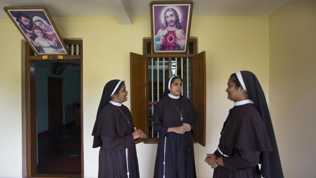 Sister Josephine Villoonnickal (L), Sister Alphy Pallasseril (C), and Sister Anupama Kelamangalathu talk at St. Francis Mission Home, in Kuravilangad. The protest divided India’s Catholic community. The accuser and the nuns who support her are now pariahs. “Some people are accusing us of working against the church,” said one supporter, Sister Josephine Villoonnickal. “They say, ‘You are worshipping Satan.’ But we need to stand up for the truth.” (Manish Swarup / AP) Sister Josephine Villoonnickal (L), Sister Alphy Pallasseril (C), and Sister Anupama Kelamangalathu talk at St. Francis Mission Home, in Kuravilangad. The protest divided India’s Catholic community. The accuser and the nuns who support her are now pariahs. “Some people are accusing us of working against the church,” said one supporter, Sister Josephine Villoonnickal. “They say, ‘You are worshipping Satan.’ But we need to stand up for the truth.” (Manish Swarup / AP)