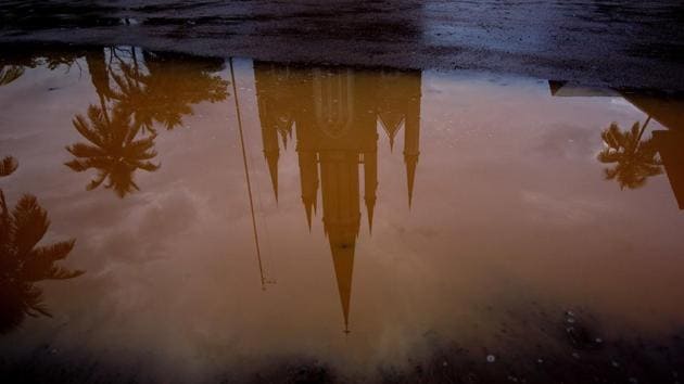 The Immaculate Heart of Mary Cathedral is reflected in a puddle after a brief spell of rain in Kottayam, Kerala. The nuns talk of Catholic priests who pushed into their bedrooms and who pressured them to turn close friendships into sex. Across India, they talk about being groped and kissed, of hands pressed against them by men they were raised to believe were representatives of Jesus Christ. (Manish Swarup / AP) The Immaculate Heart of Mary Cathedral is reflected in a puddle after a brief spell of rain in Kottayam, Kerala. The nuns talk of Catholic priests who pushed into their bedrooms and who pressured them to turn close friendships into sex. Across India, they talk about being groped and kissed, of hands pressed against them by men they were raised to believe were representatives of Jesus Christ. (Manish Swarup / AP)
