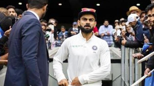 India's captain Virat Kohli walks up the player race during play on day five of the third cricket test between India and Australia in Melbourne, Australia, Sunday, Dec. 30, 2018. (AP) India's captain Virat Kohli walks up the player race during play on day five of the third cricket test between India and Australia in Melbourne, Australia, Sunday, Dec. 30, 2018. (AP)