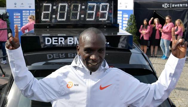 Kenya's Eliud Kipchoge holds the current marathon world record with atime of 2h01m39s.(AFP)