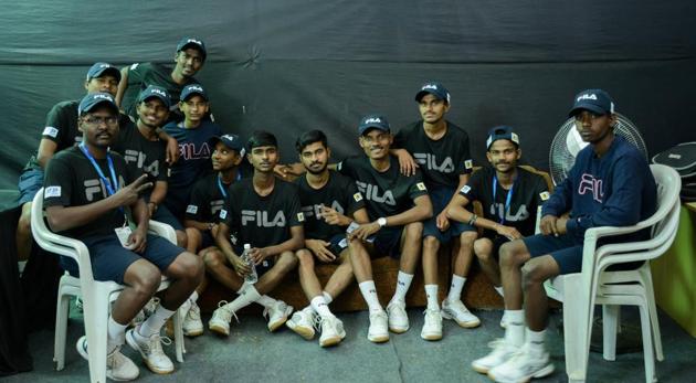 Part of the contingent of ball boys operating at Tata Open Maharashtra at Balewadi on Wednesday.(Milind Saurkar/HT Photo)