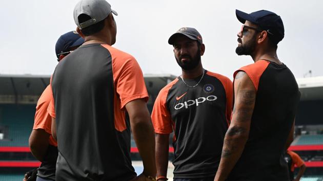 Virat Kohli (R) talks to teammates before a training session ahead of the fourth and final Test. (AFP) Virat Kohli (R) talks to teammates before a training session ahead of the fourth and final Test. (AFP)
