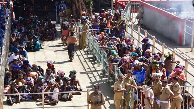 Devotees wait in line to visit the Sabarimala temple in Kerala following the entry of two women on January 2.(AFP)