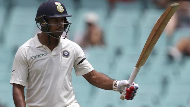 Mayank Agarwal raises his bat after making 50 runs against Australia. (AP) Mayank Agarwal raises his bat after making 50 runs against Australia. (AP)