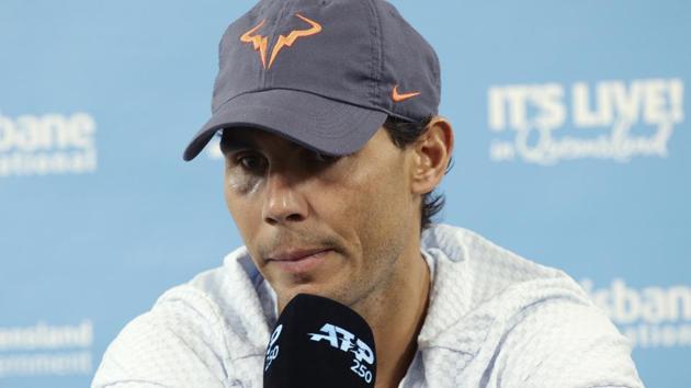 Rafael Nadal of Spain announces that he is pulling out of the tournament due to injury at the Brisbane International. (AP) Rafael Nadal of Spain announces that he is pulling out of the tournament due to injury at the Brisbane International. (AP)